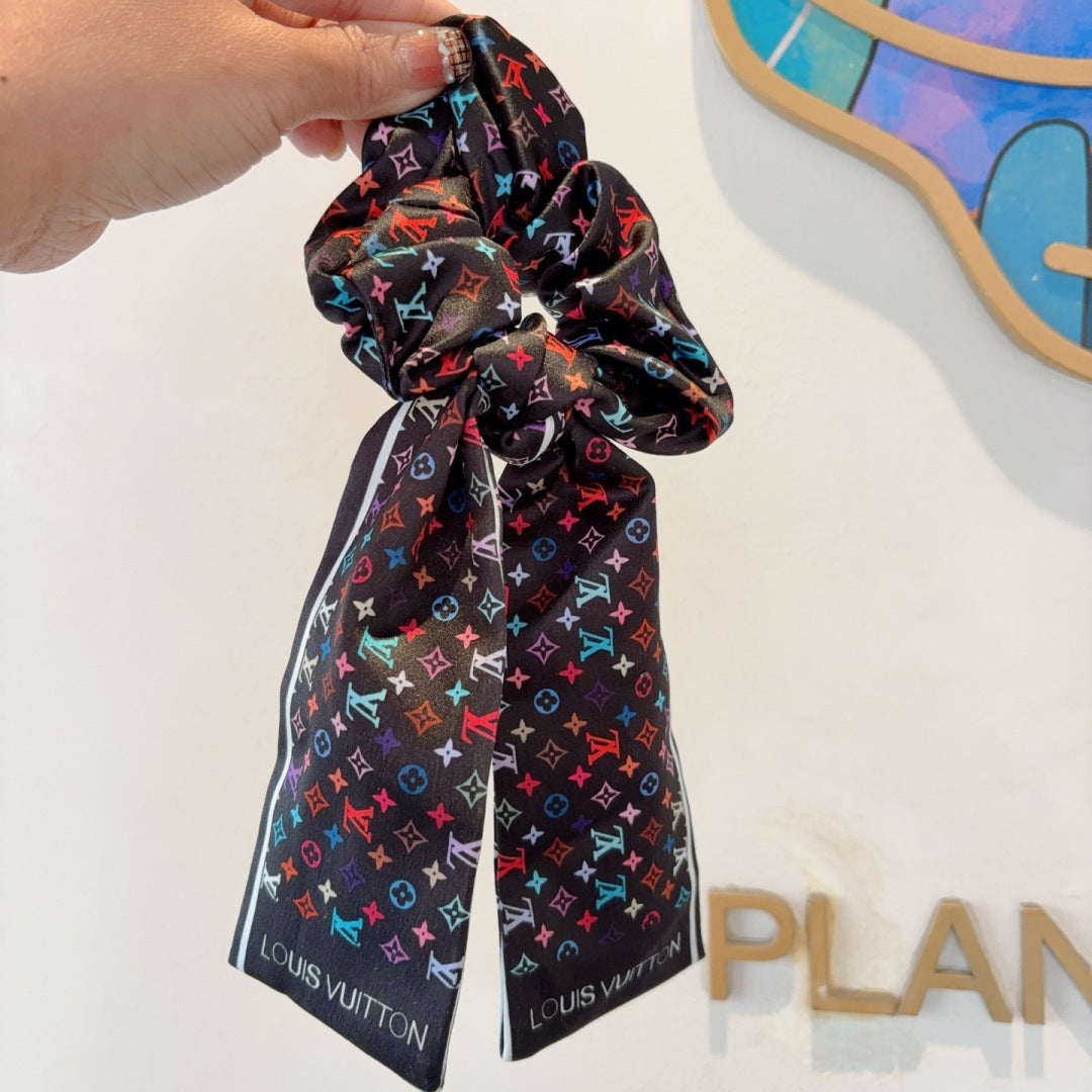 Louis Classic letter streamer ponytail hair tie