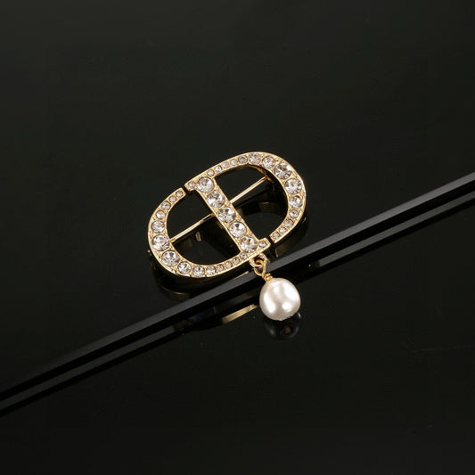 CD New Alphabet brooch