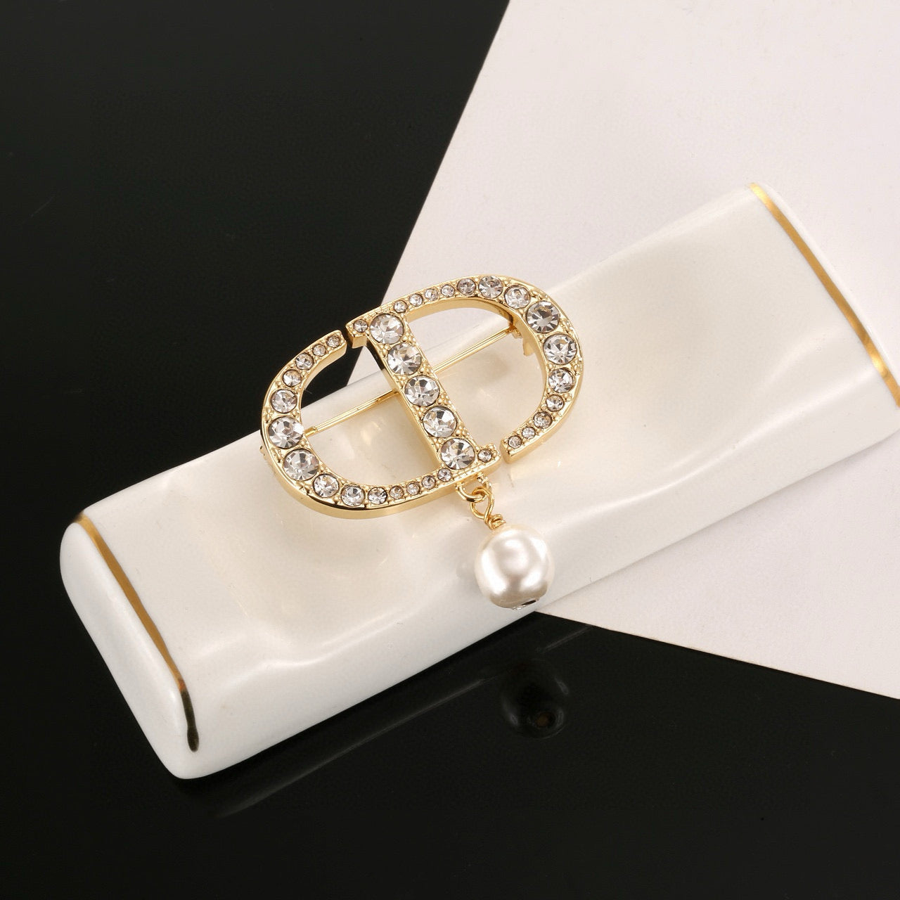 CD New Alphabet brooch