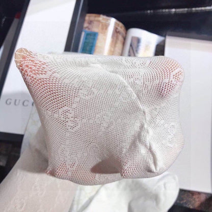 Guc One-piece fishnet pants