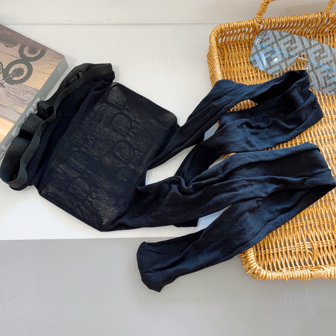 CD fishnet stockings with big D letter