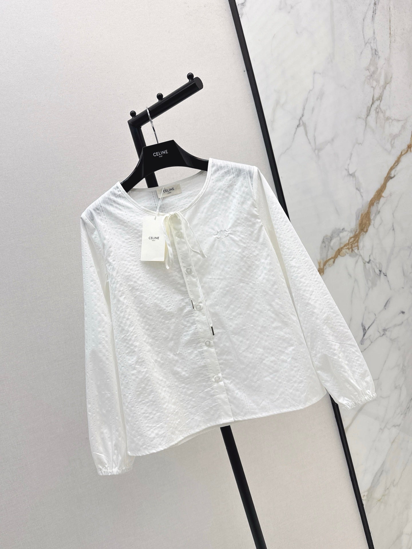 Ce1n NEW button shirt