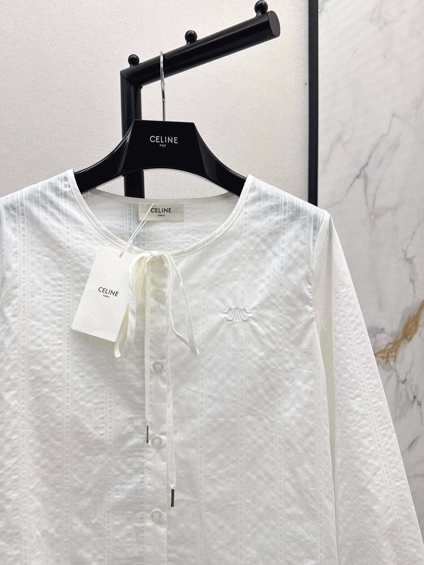 Ce1n NEW button shirt