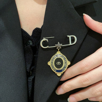 CD New Alphabet brooch