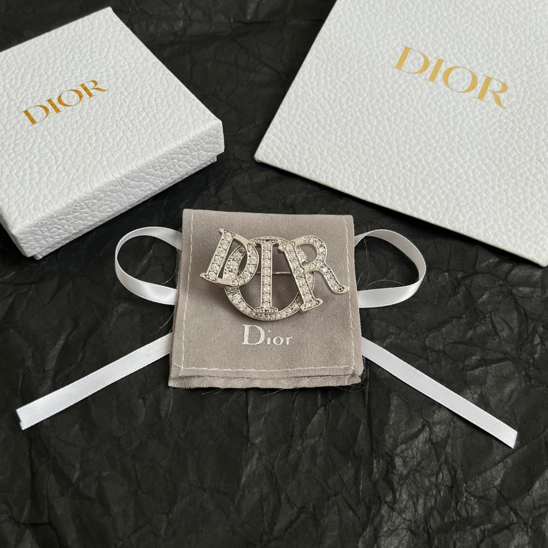 CD New Alphabet brooch