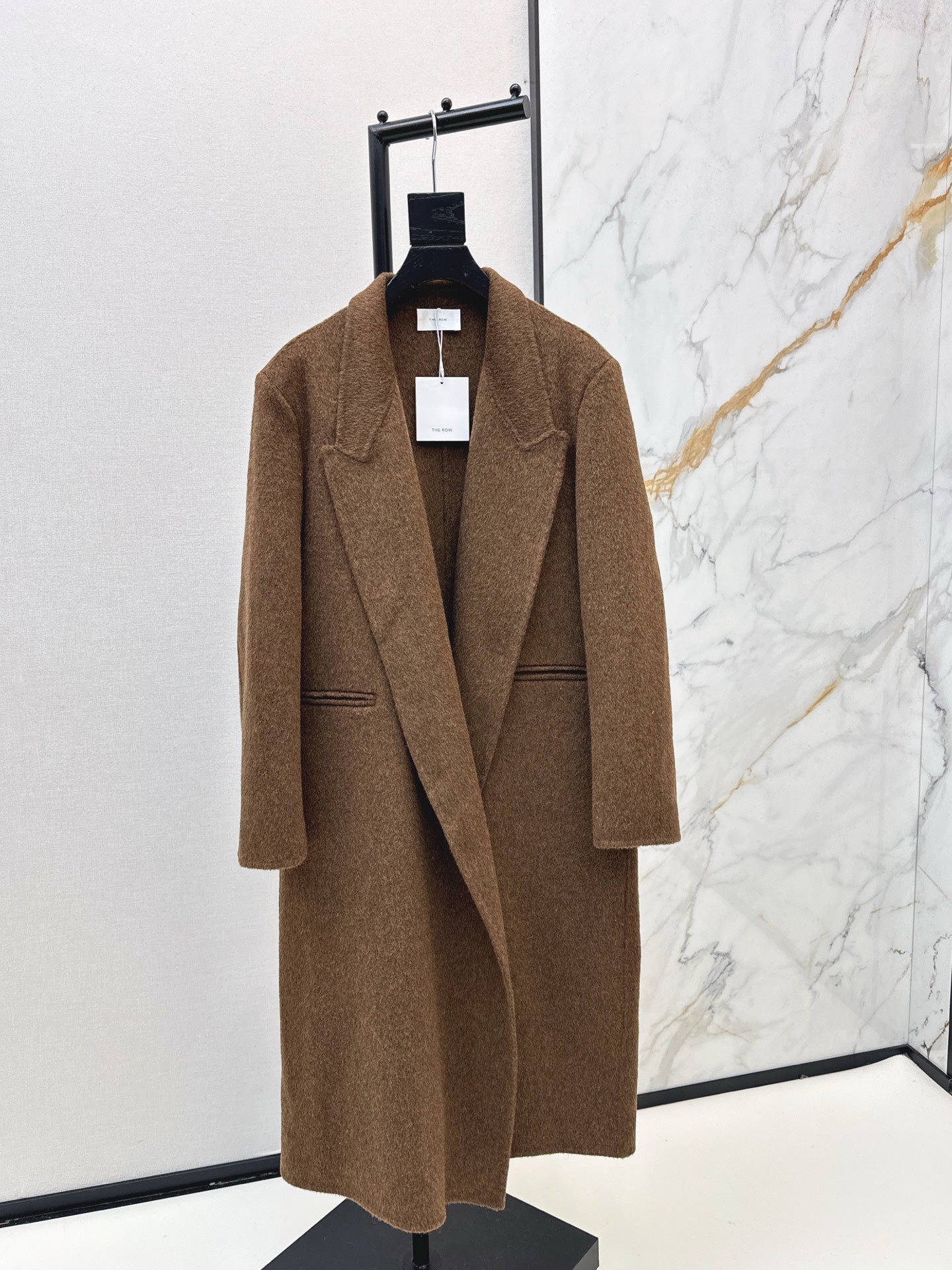 Row NEW woolen overcoats