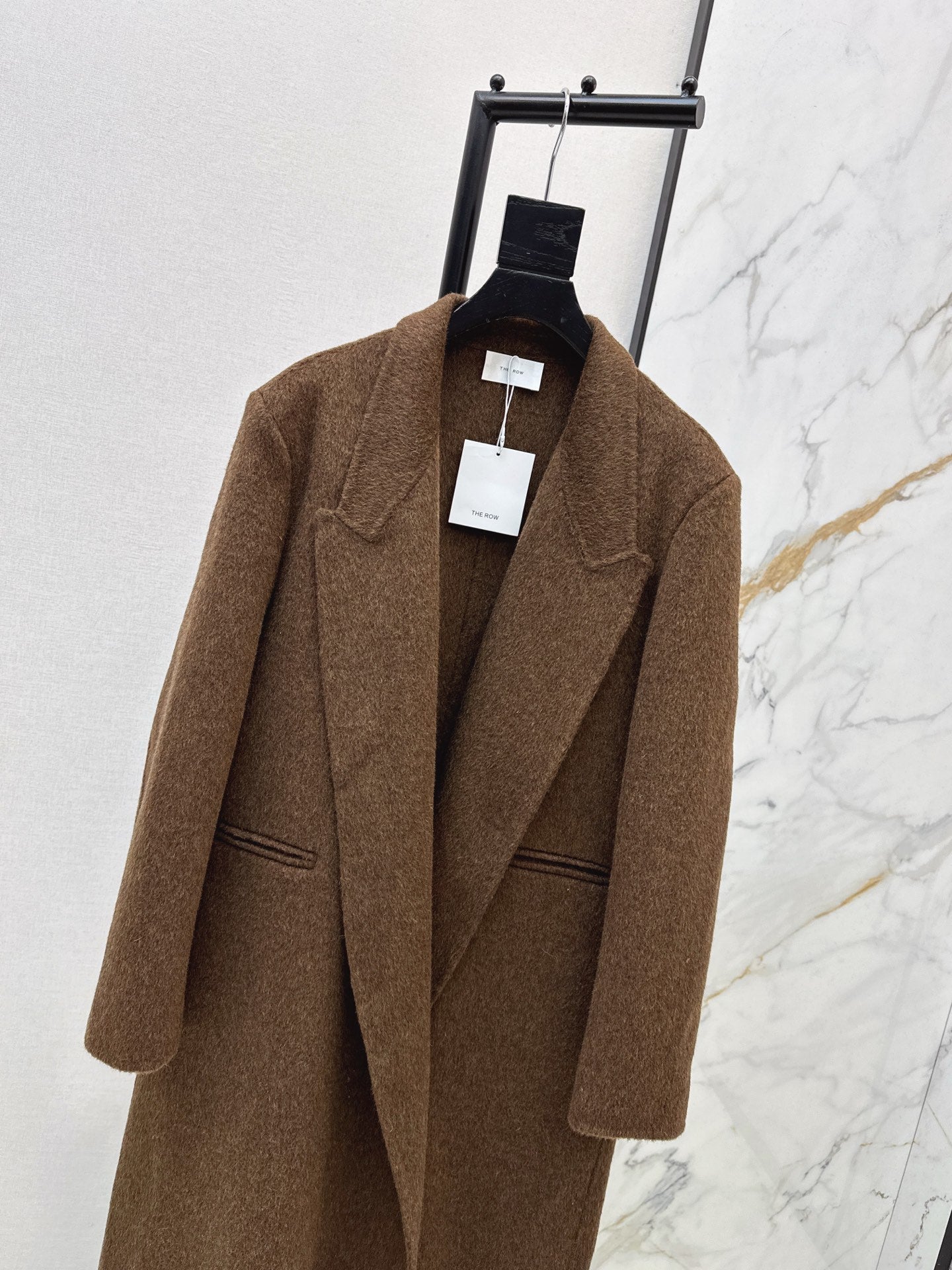 Row NEW woolen overcoats