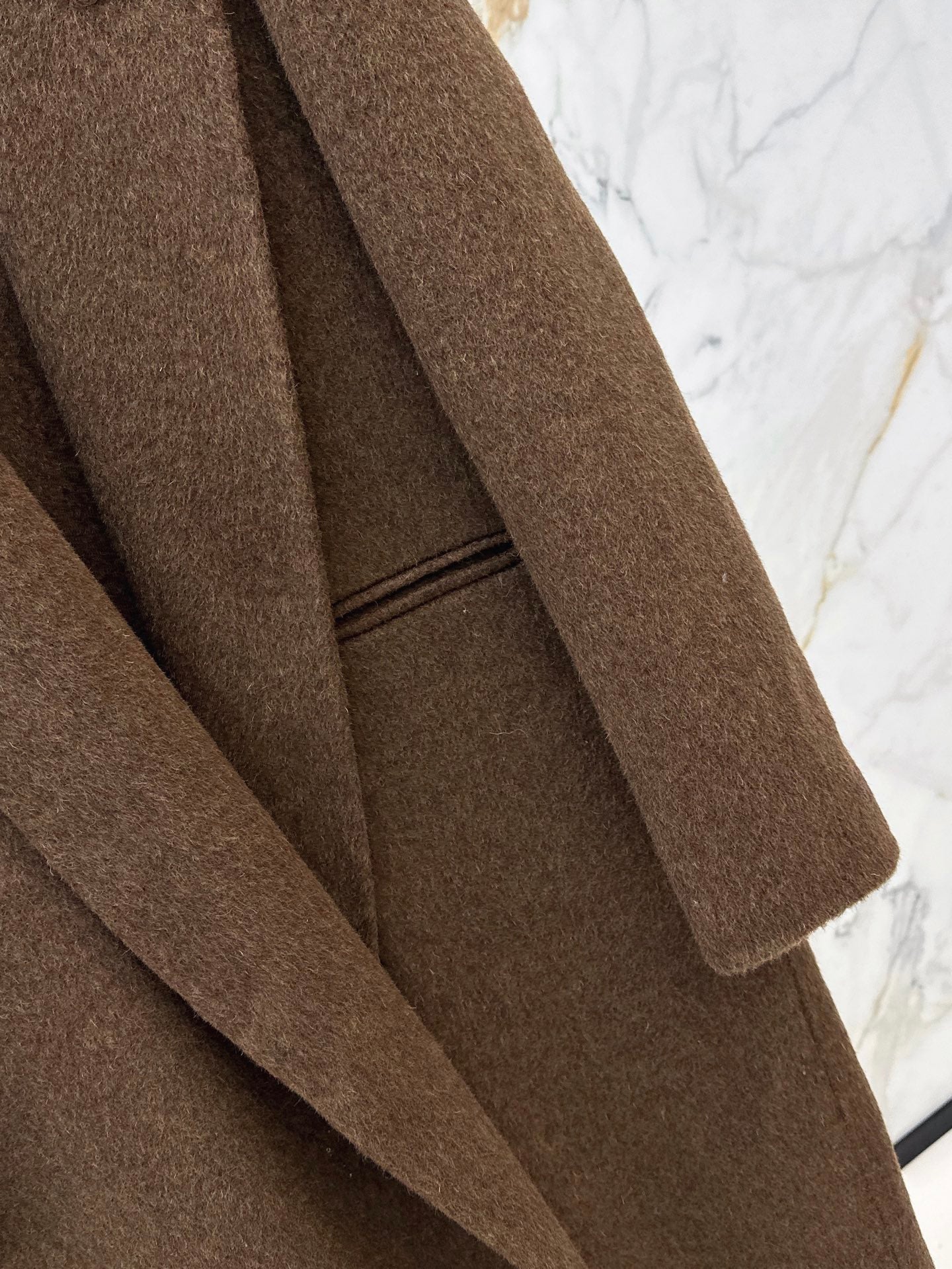 Row NEW woolen overcoats