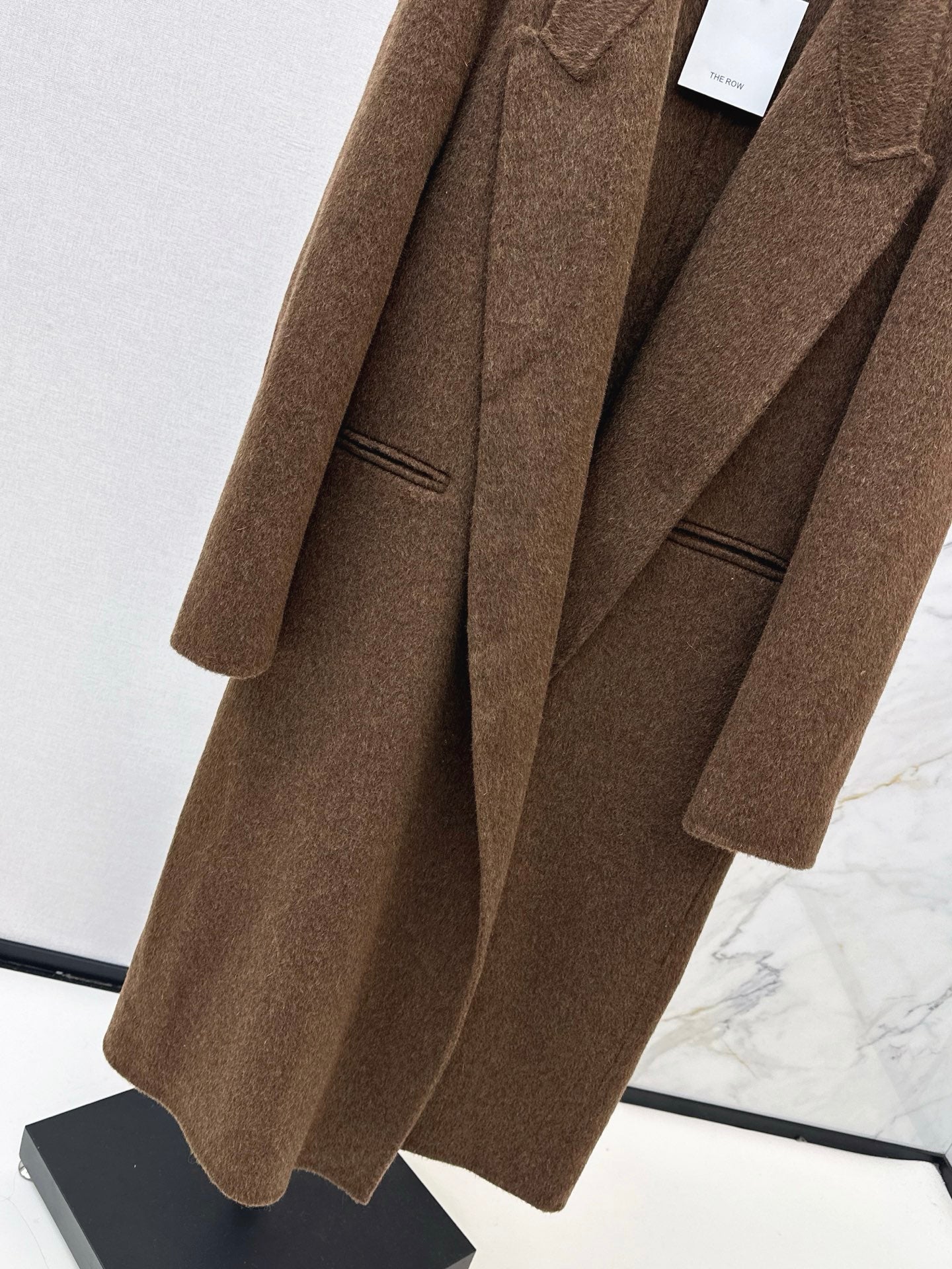 Row NEW woolen overcoats