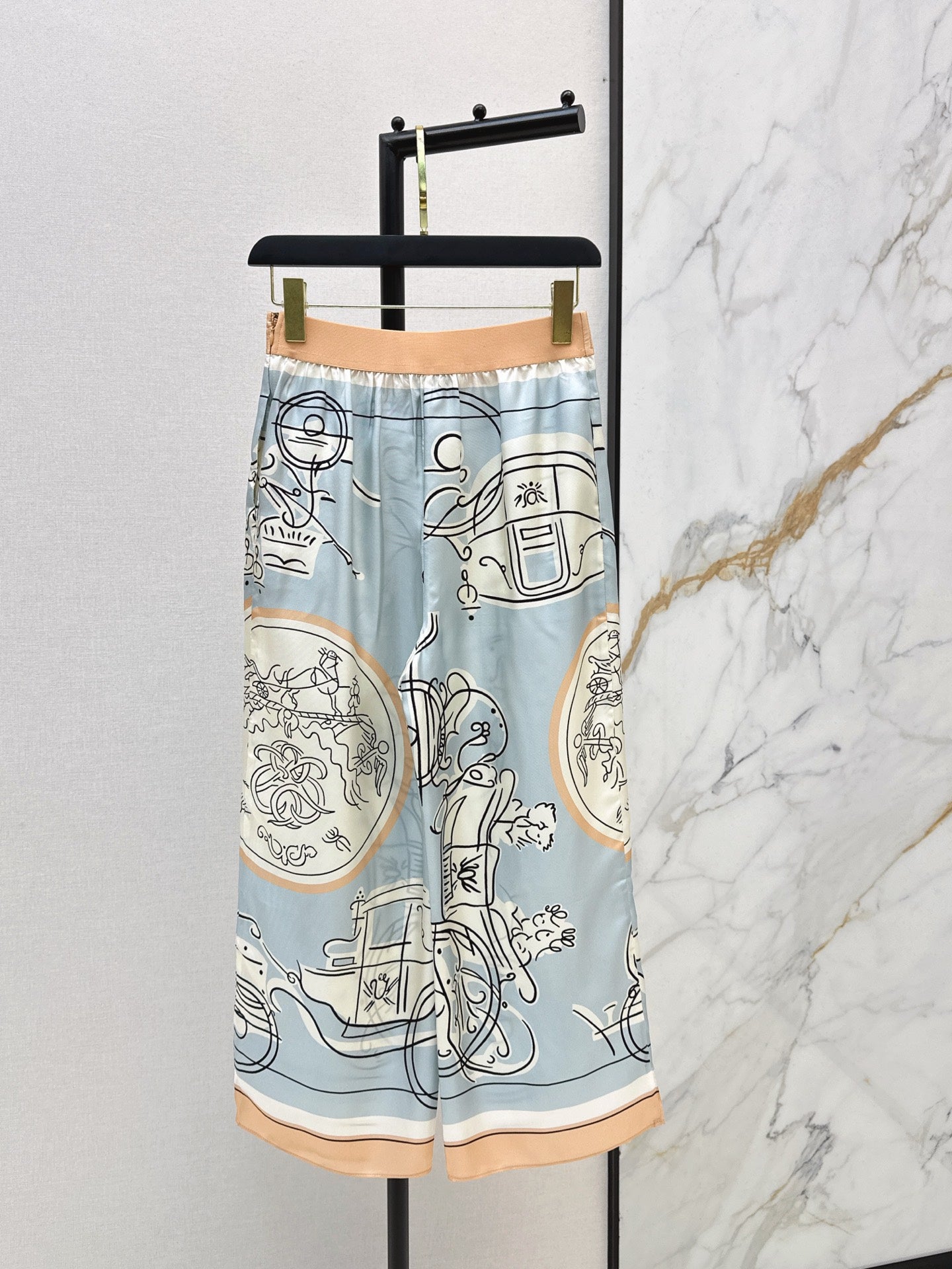 Herm NEW print wide-leg pants