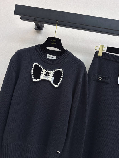 Chan NEW wool hollow bow suit