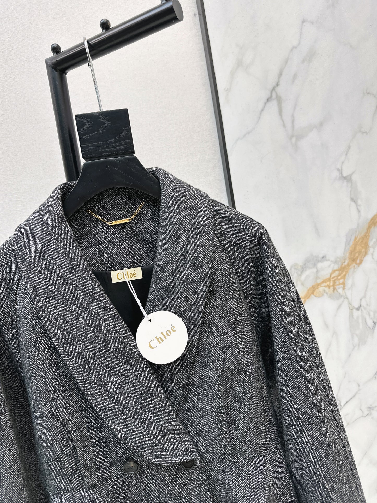 Chol NEW ruffle-hem belted jacket